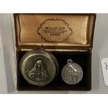 Early 20th cent. Christian oval Holy Mother and Child medallion. White metal stamped Jerusalem ·