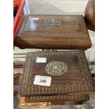 20th cent. Asian treen boxes heavily carved with white metal inset lotus flower decoration.