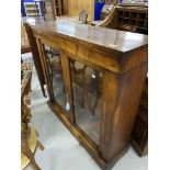 19th cent. Walnut display case with fruitwood inlay and glazed double doors.