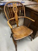 Late 18th cent. Oak and elm Windsor hoop wheel back armchair.