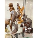 20th cent. Treen carved figurines tribesman and woman, plus four other figures.