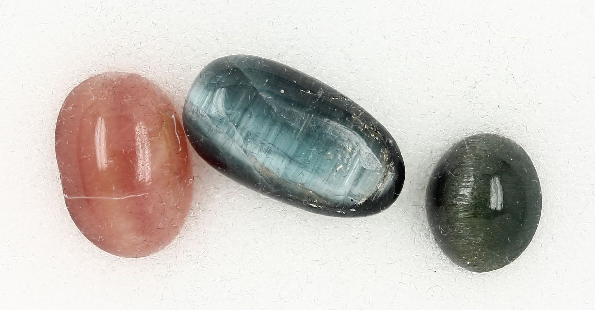 Lot loose tourmaline cat's eyes , total approx. 7.83 ct, different sizes and colours