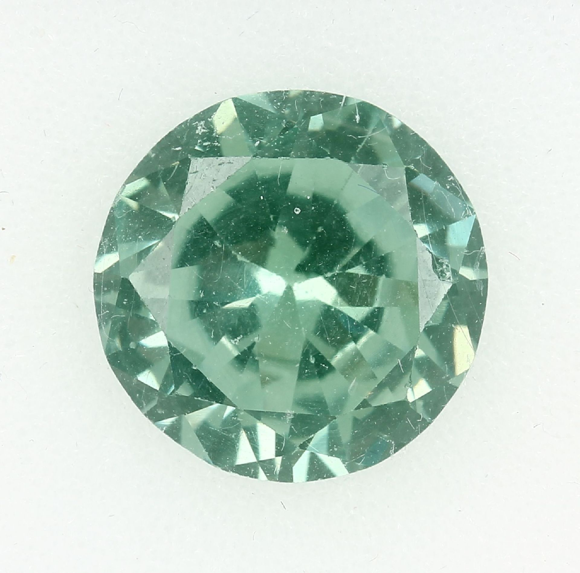 Loose zircon, approx. 12.57 ct , round bevelled, diam. approx. 15 mm