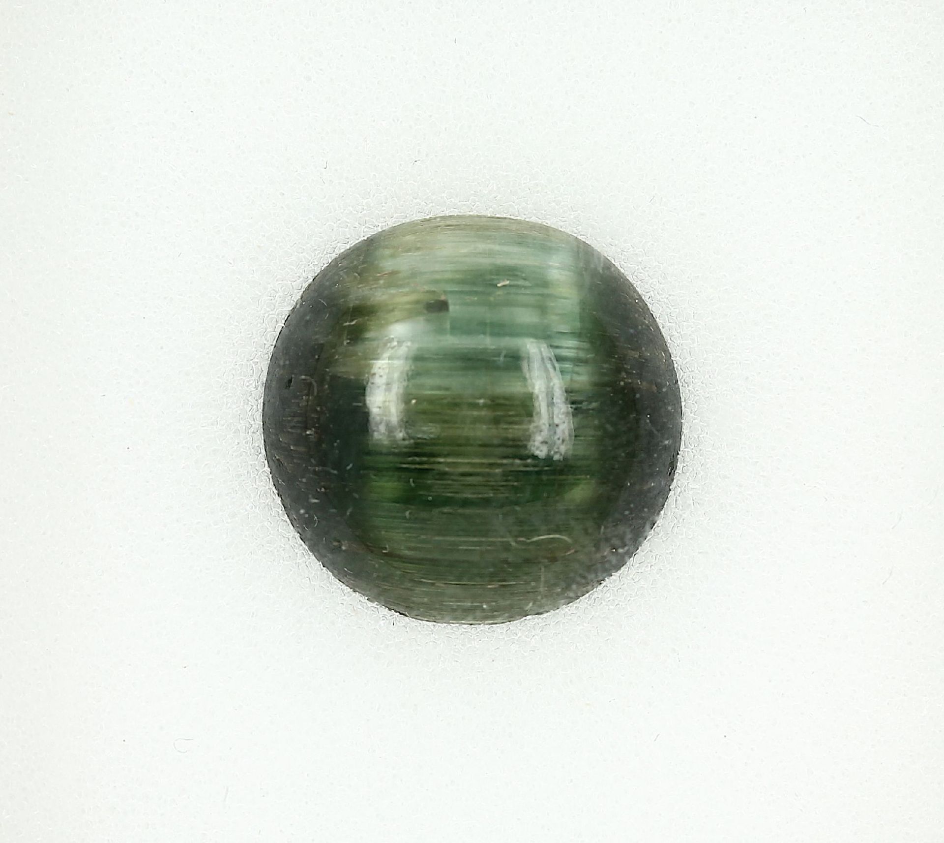 Loose tourmaline cat's eye cabochon , approx. 15.3 ct
