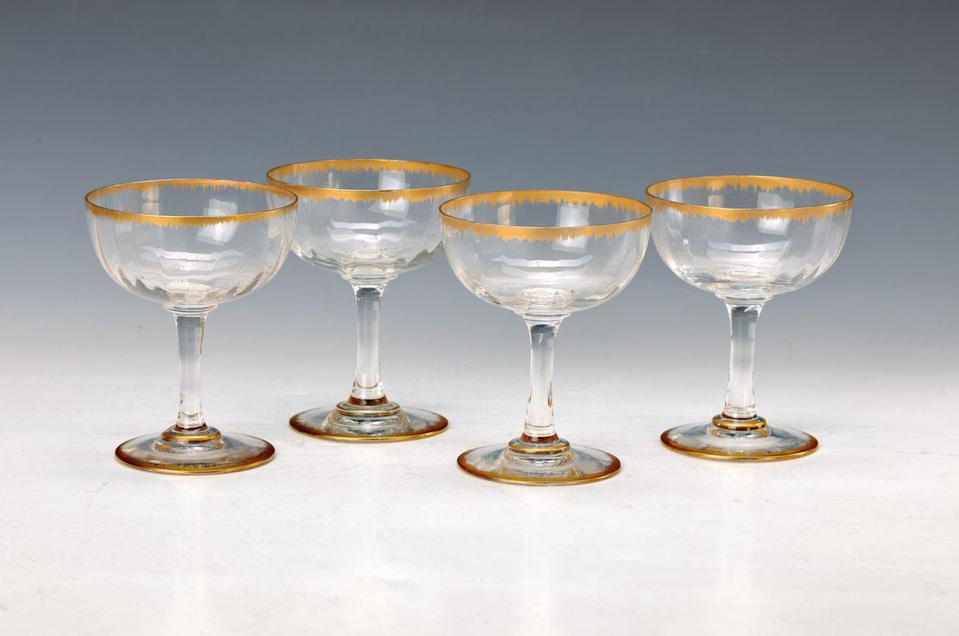 6 glasses, Daum Nancy, Middle of 20th c., optical blown colorless glass, gold lace border, H.