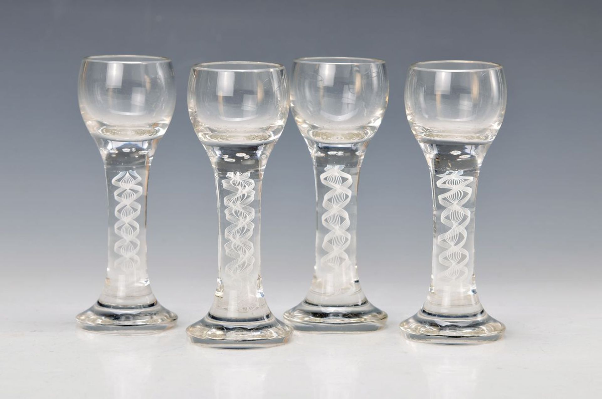 4 schnapps glasses, Josephinenhütte, 19th c., colorless glass with blown opaque-white spiral, H.