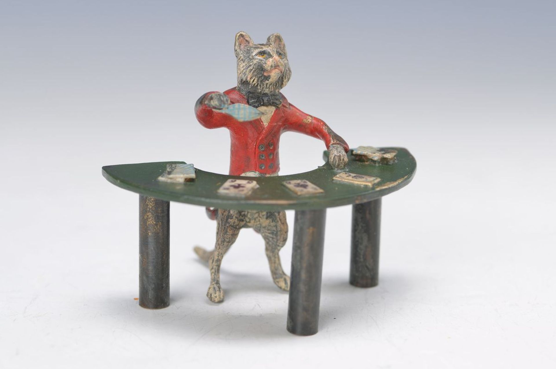 Vienna Bronze, 2.H.20.th. century, cat on Poker table, colorful painted, signed miner, H. 6 cm, W