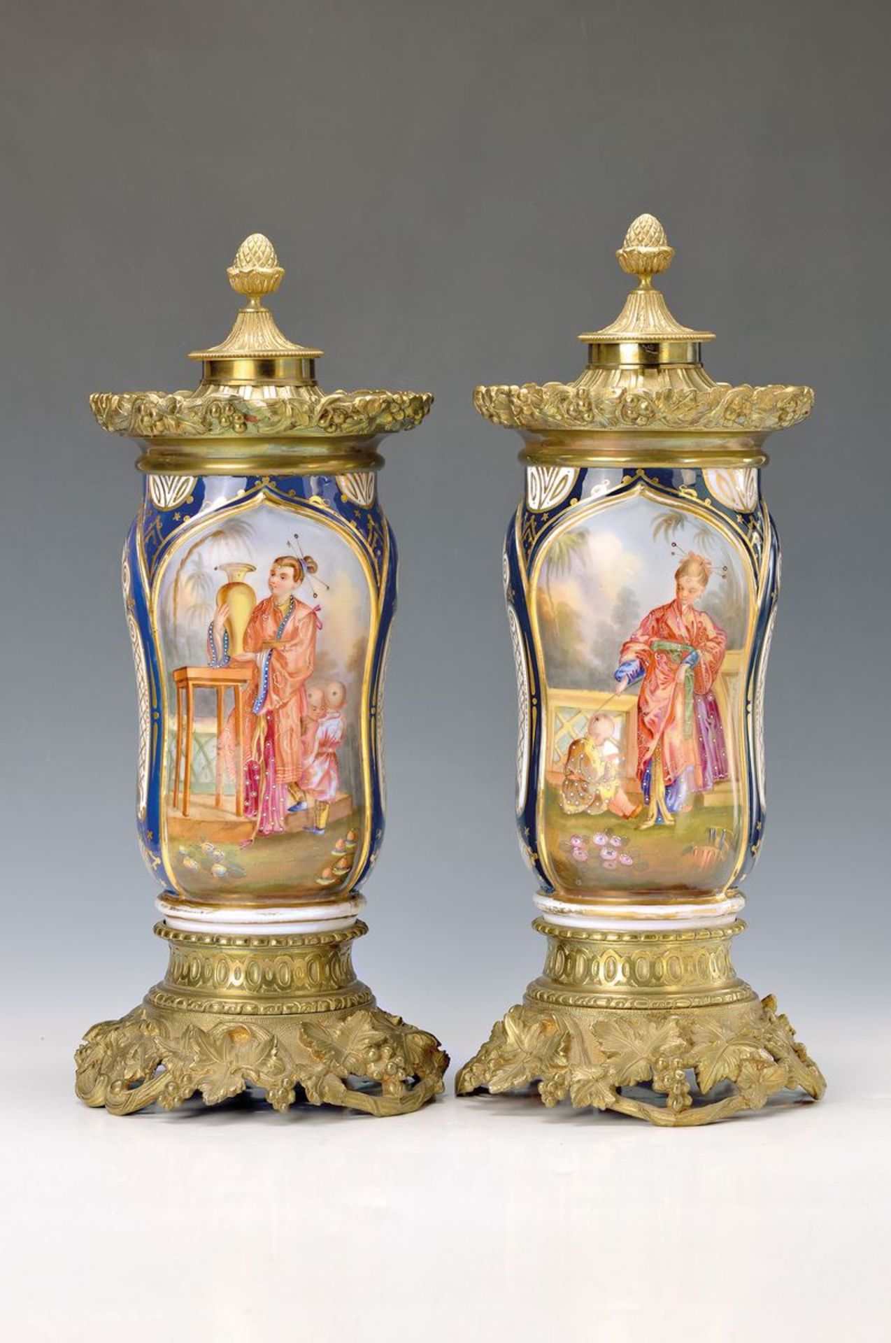 two large decoration vessels, France, around 1860, porcelain, encircling two-sided painting, one