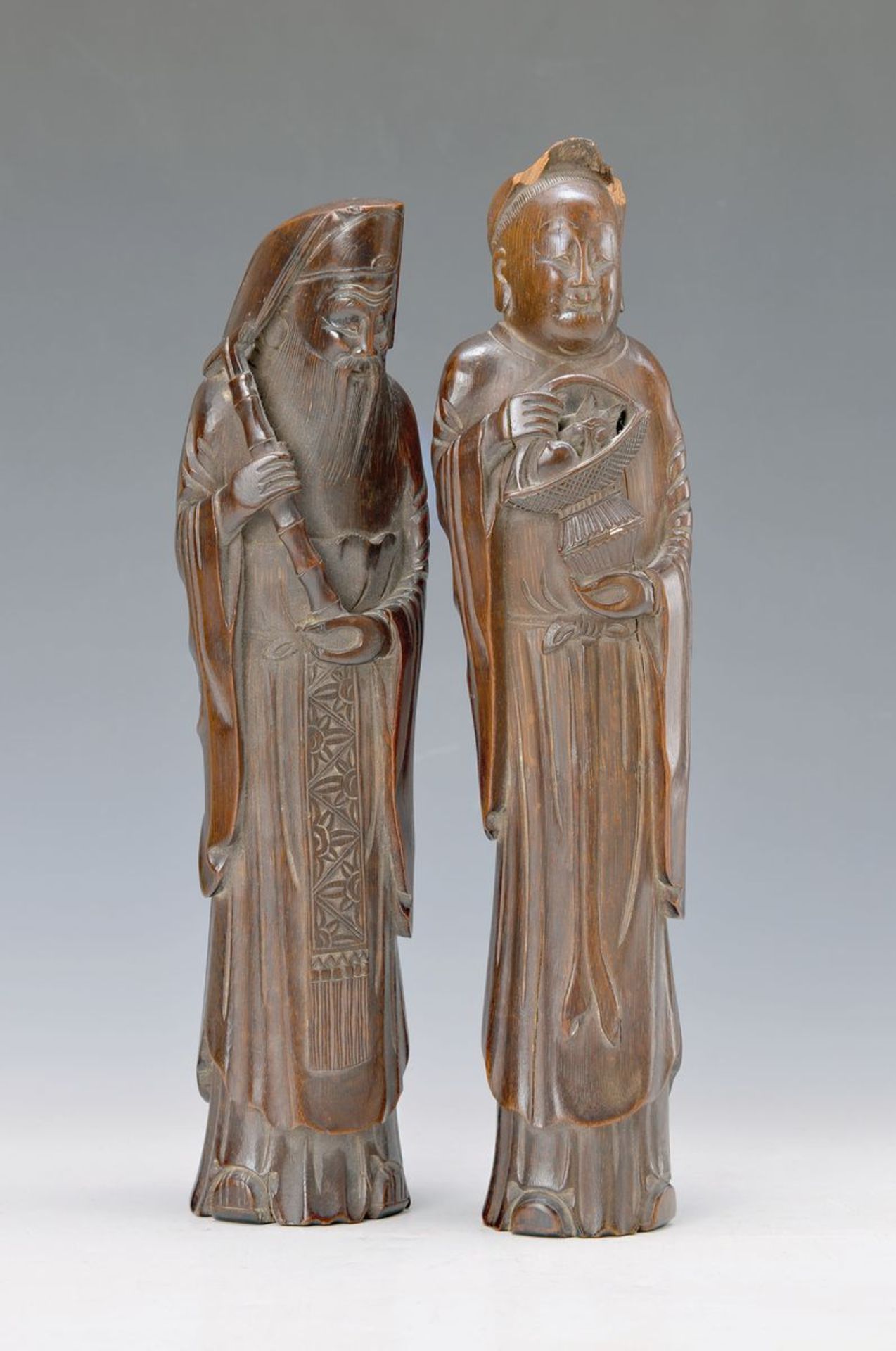 couple of carvings, China, around 1900, bamboofinely carved, representations two bearer of