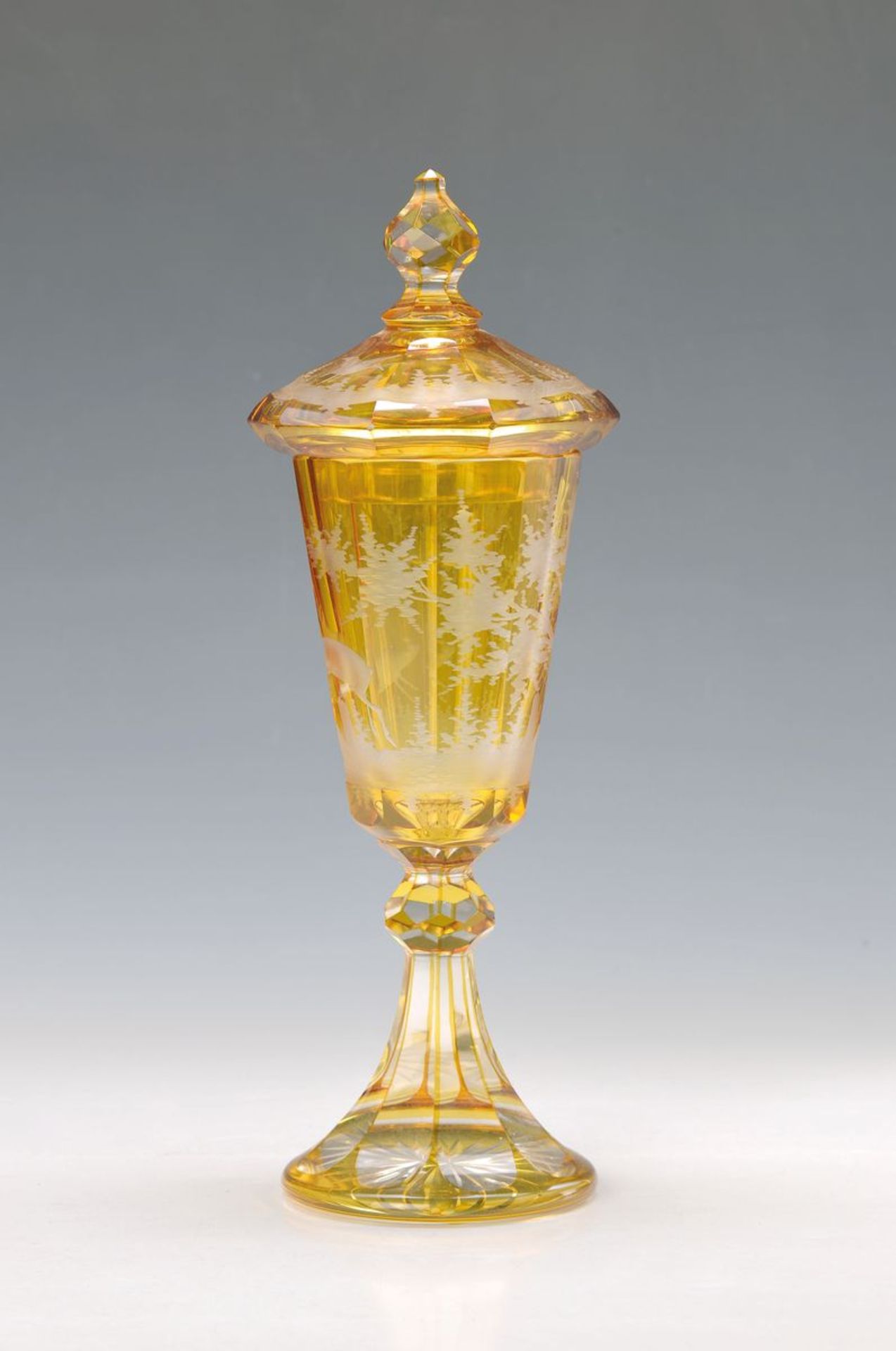 goblet, Bohemia, around 1920, colourless crystal glass, yellow painted, encircling decor with deers,