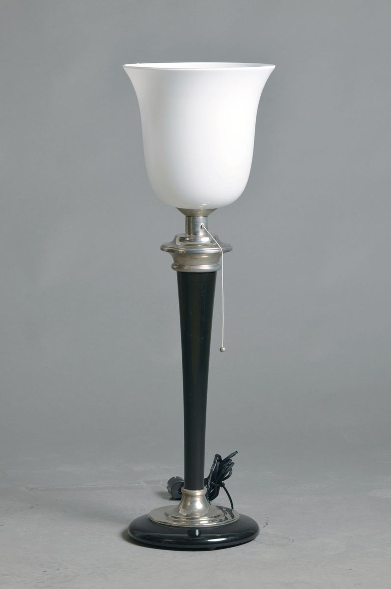 Mazda-lamp, in style of the 1930s, black wooden foot with chrome plated appliqués, opaline glass
