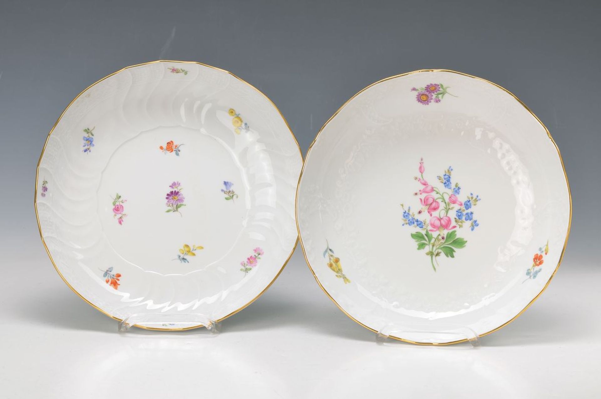 two round bowls, Meissen, 2.H.20th c., colorful painting: flower I., bowl with floralembossment,