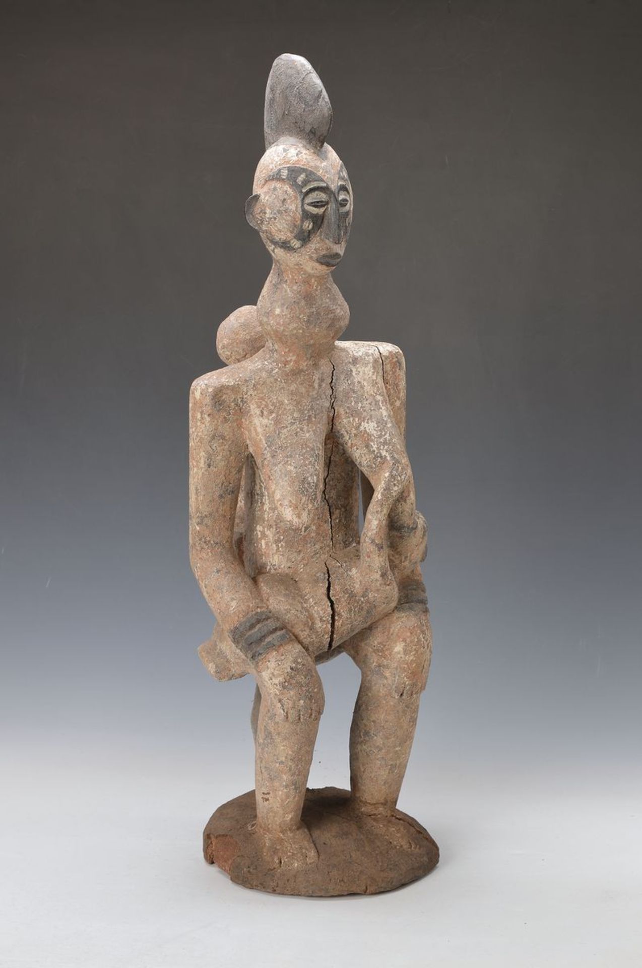 Sculpture, Nigeria, approx. 40-50 years old, mother with twins, feeding one child, wood, ancient