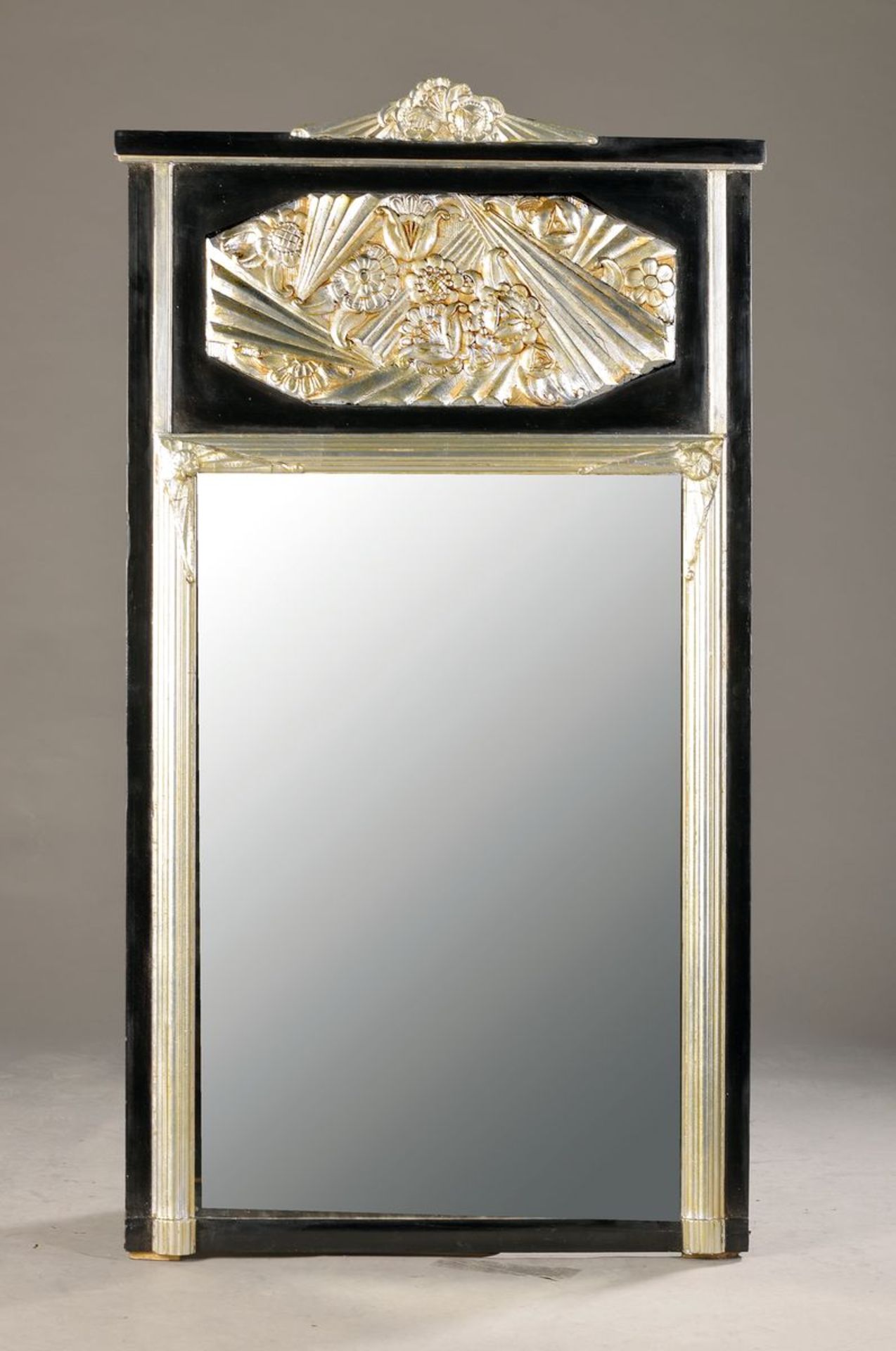 Mirror, after the model of 1925/30, wood frame lined, with abstract flower leaves and rays, black