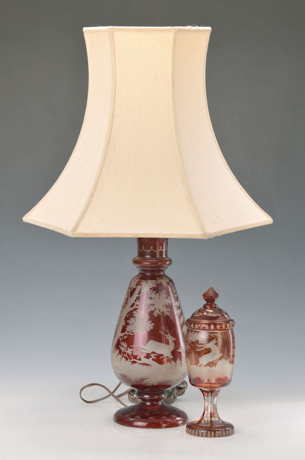 lamp and goblet Bohemia, 1920s, colorless glass, ruby red, hunting motifs, lamp H. 64 cm, Fu. not