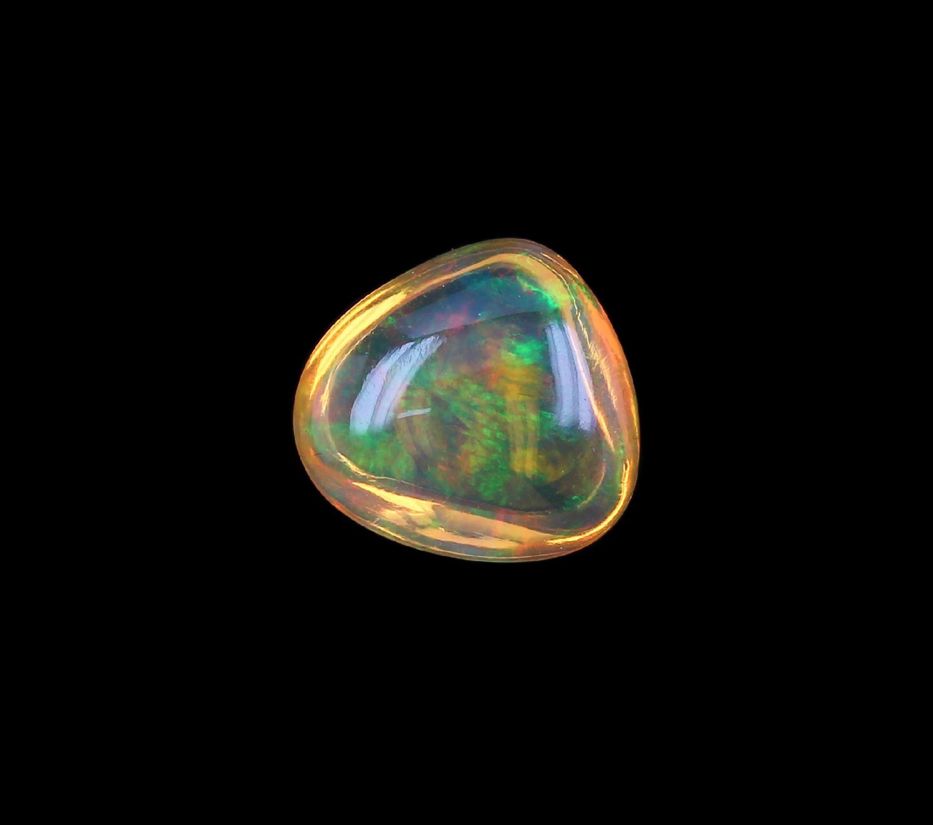 Loose fire opal approx. 5.93 ct , orangecoloured with nice green play of colours