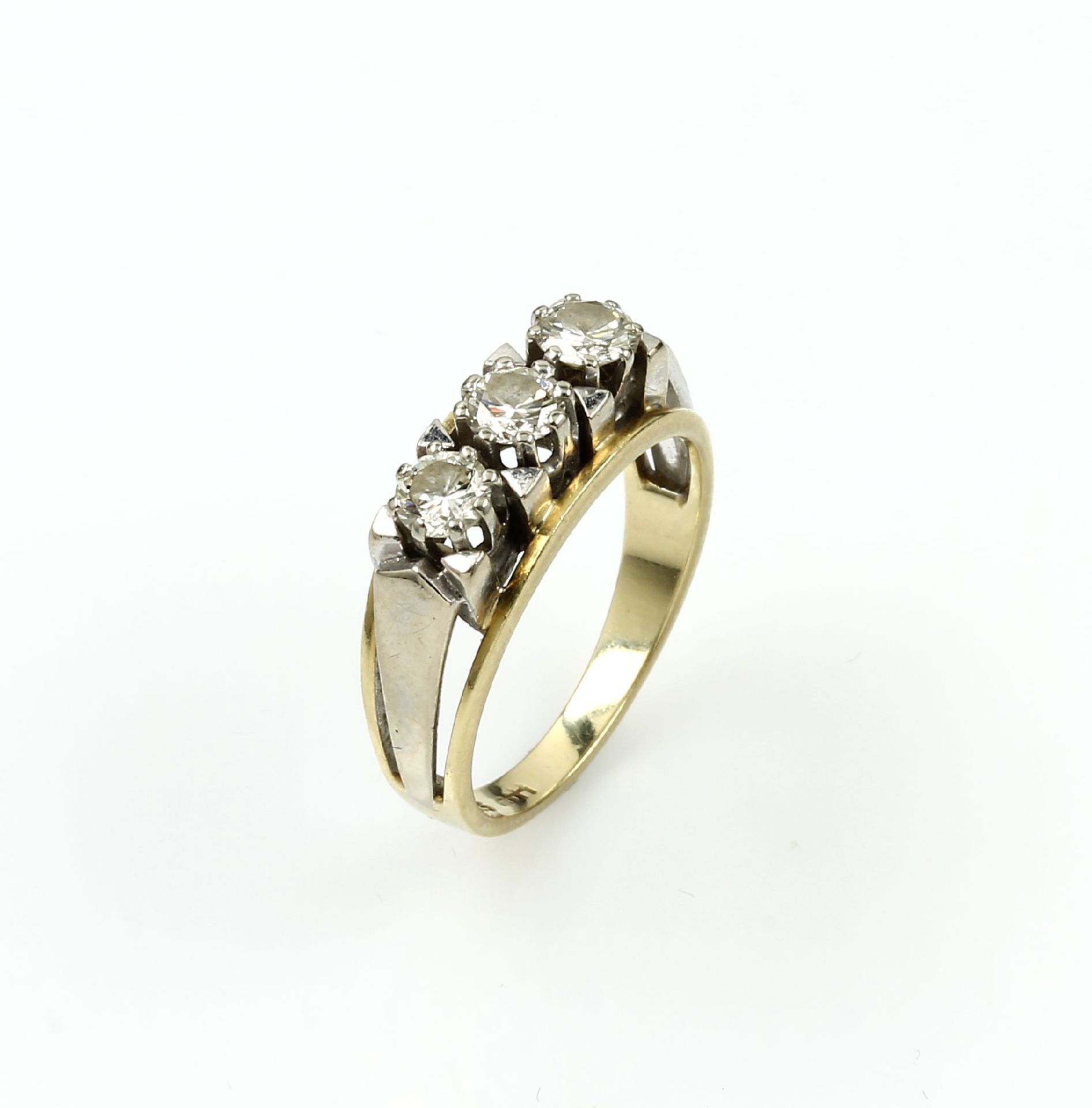 14 kt gold ring with brilliants , YG/WG 585/000, in WG setting 3 brilliants total approx. 0.75 ct