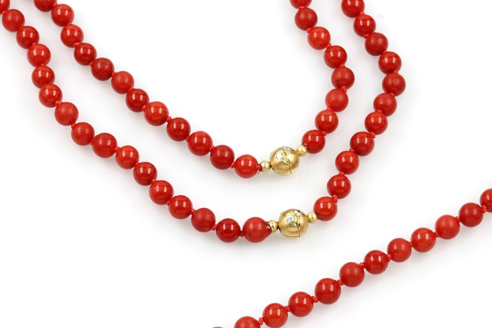 Bracelet and necklace with corals , extra long chain with 2 clasps in 18 kt gold, YG 750/000, with 5