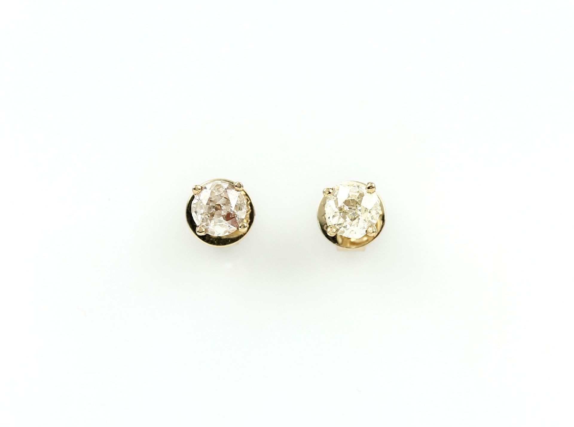 Pair of 14 kt gold earrings with brilliants , YG 585/000, 2 brilliants total approx. 0.73 ct Top