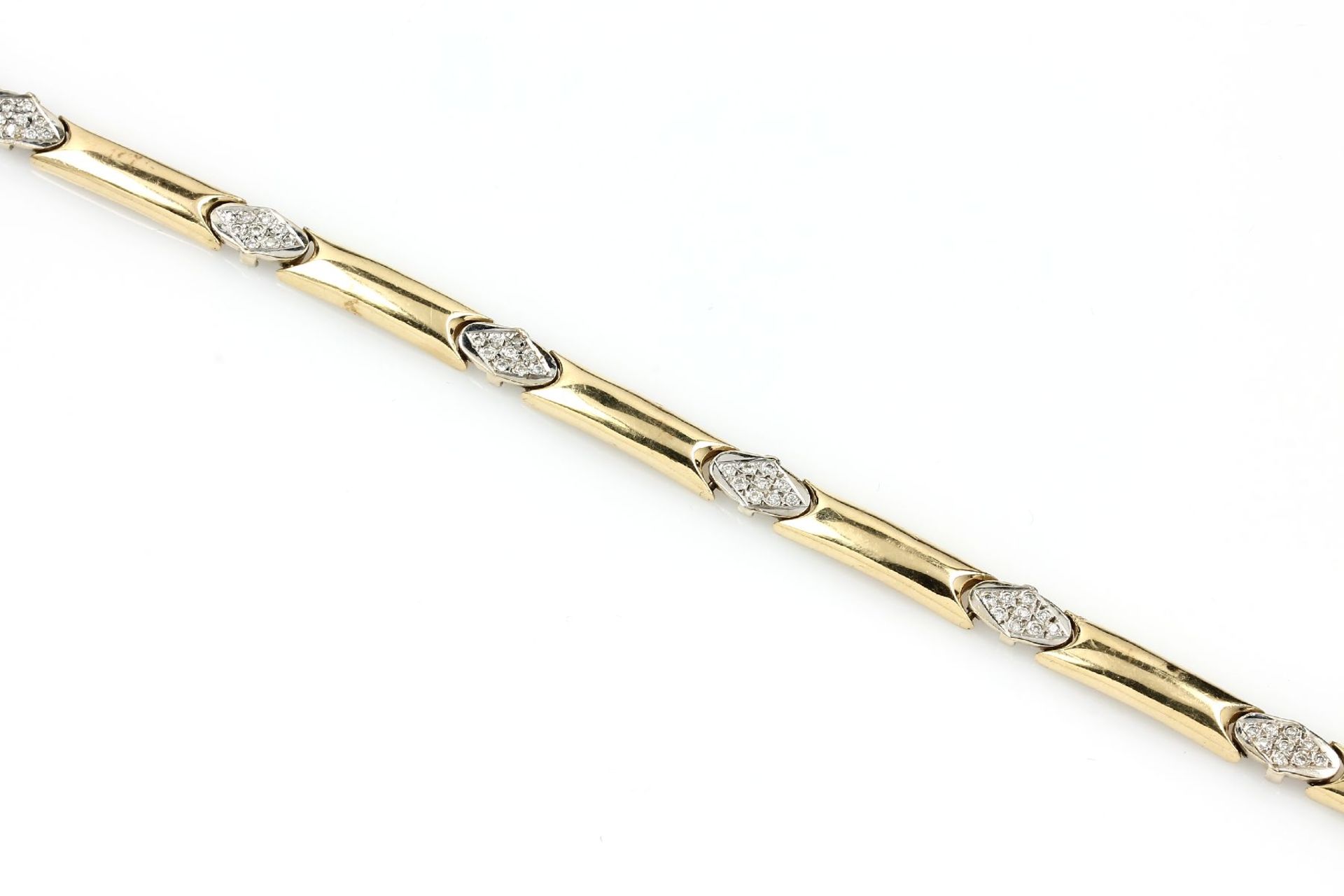 14 kt gold bracelet with diamonds , YG/WG 585/000, 63 diamonds in WG setting total approx. 0.30 ct