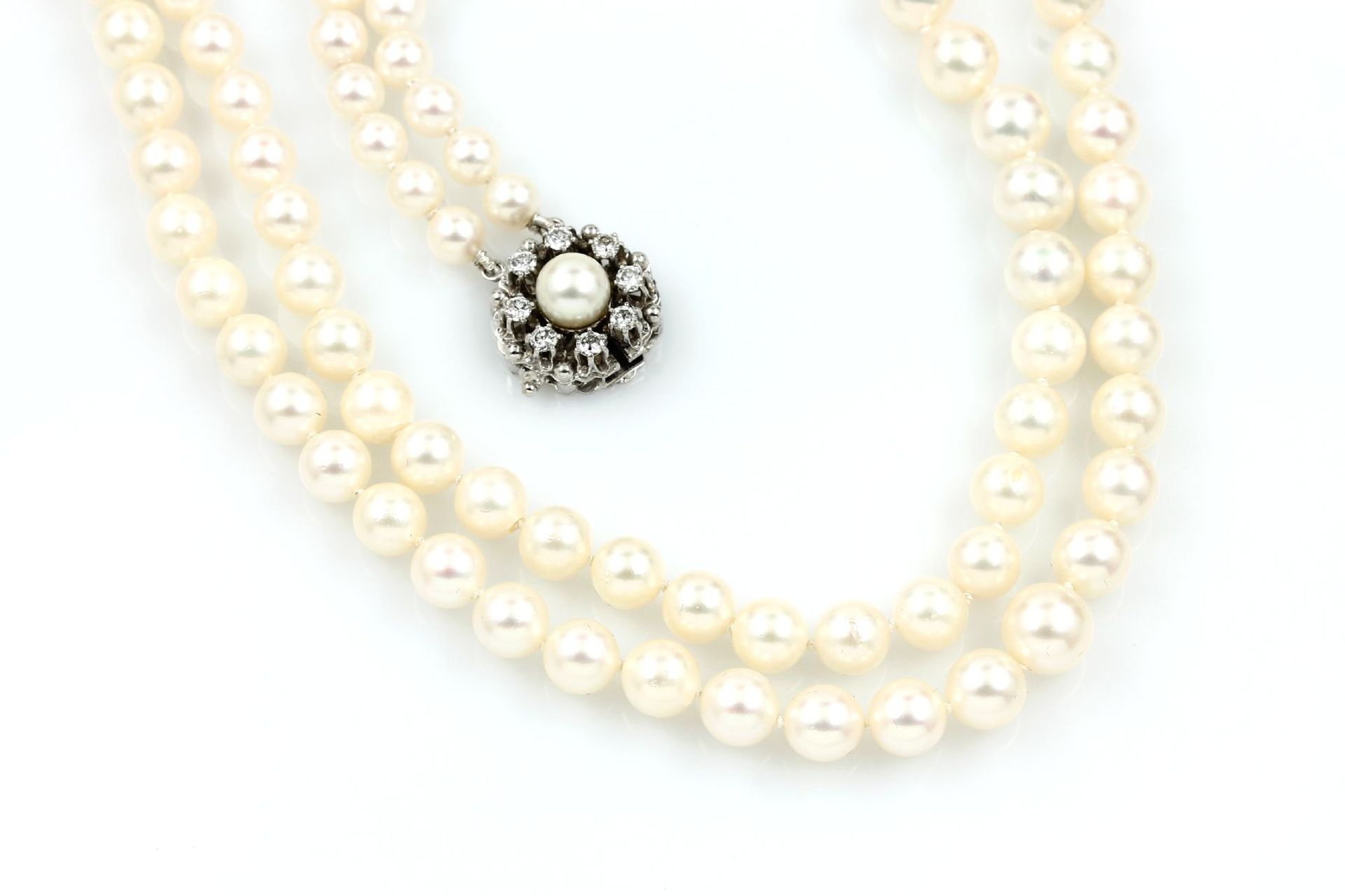 2-row necklace made of cultured akoya pearls , clasp WG 585/000, with brilliants total approx. 0.