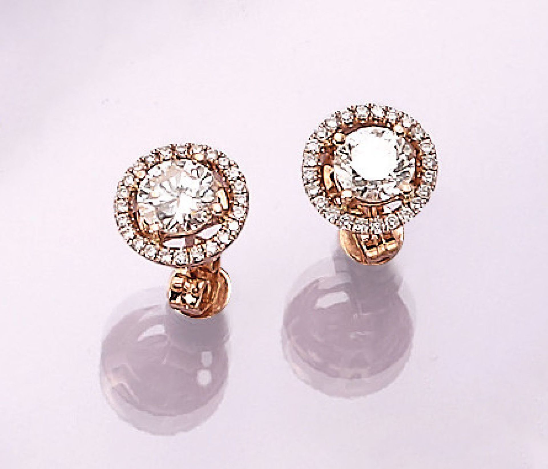 Pair of 14 kt gold earrings with brilliants , 2 brilliants zus approx. 1.28 ct Wesselton/si-p 1,