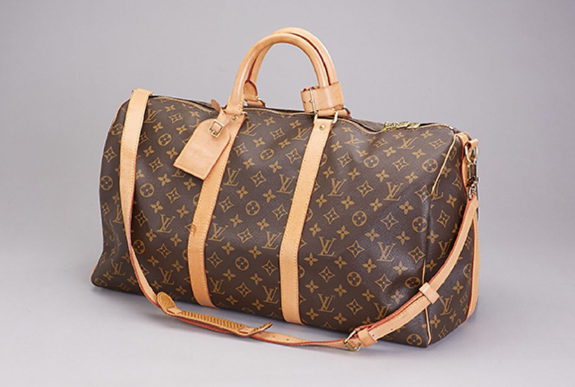 LOUIS VUITTON travelling bag, "KEEPALL 45" ,Monogram Canvas, trimming and handle nature coloured