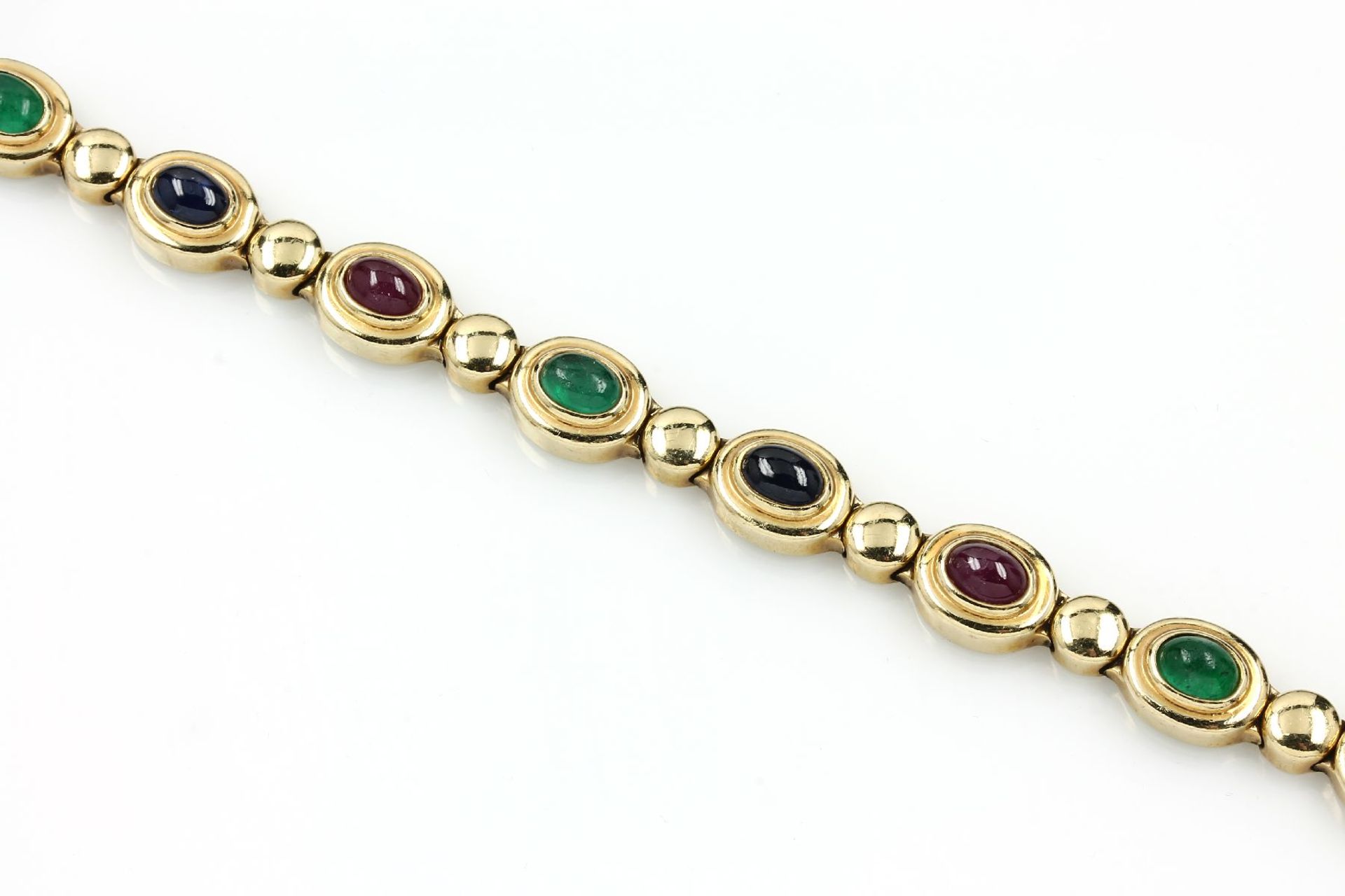 14 kt gold bracelet with coloured stones , YG 585/000, 4 oval ruby-cabochons total approx. 4.80