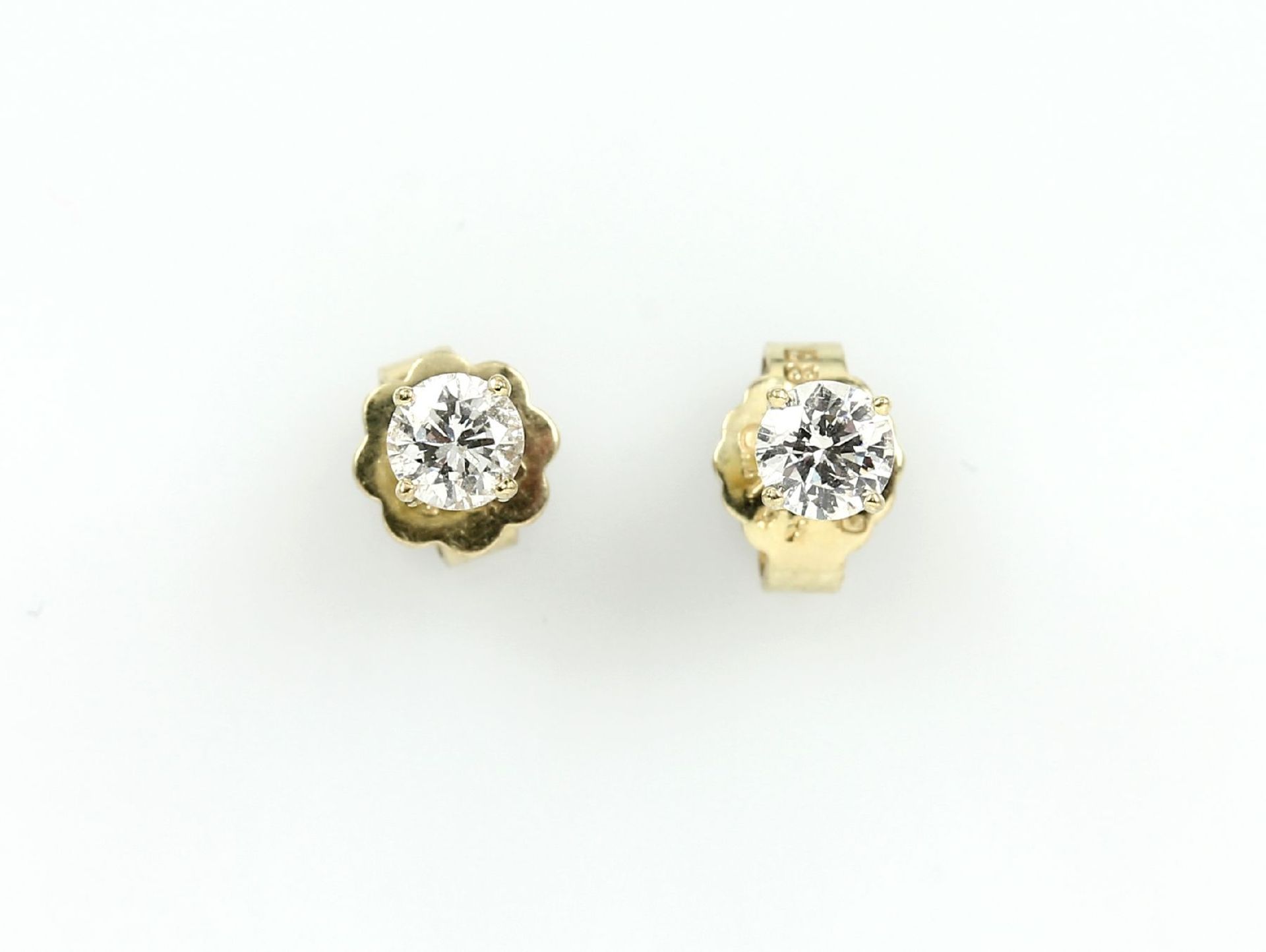 Pair of 14 kt gold earrings with brilliants , YG 585/000, 2 brilliants total 0.40 ct Wesselton/si-