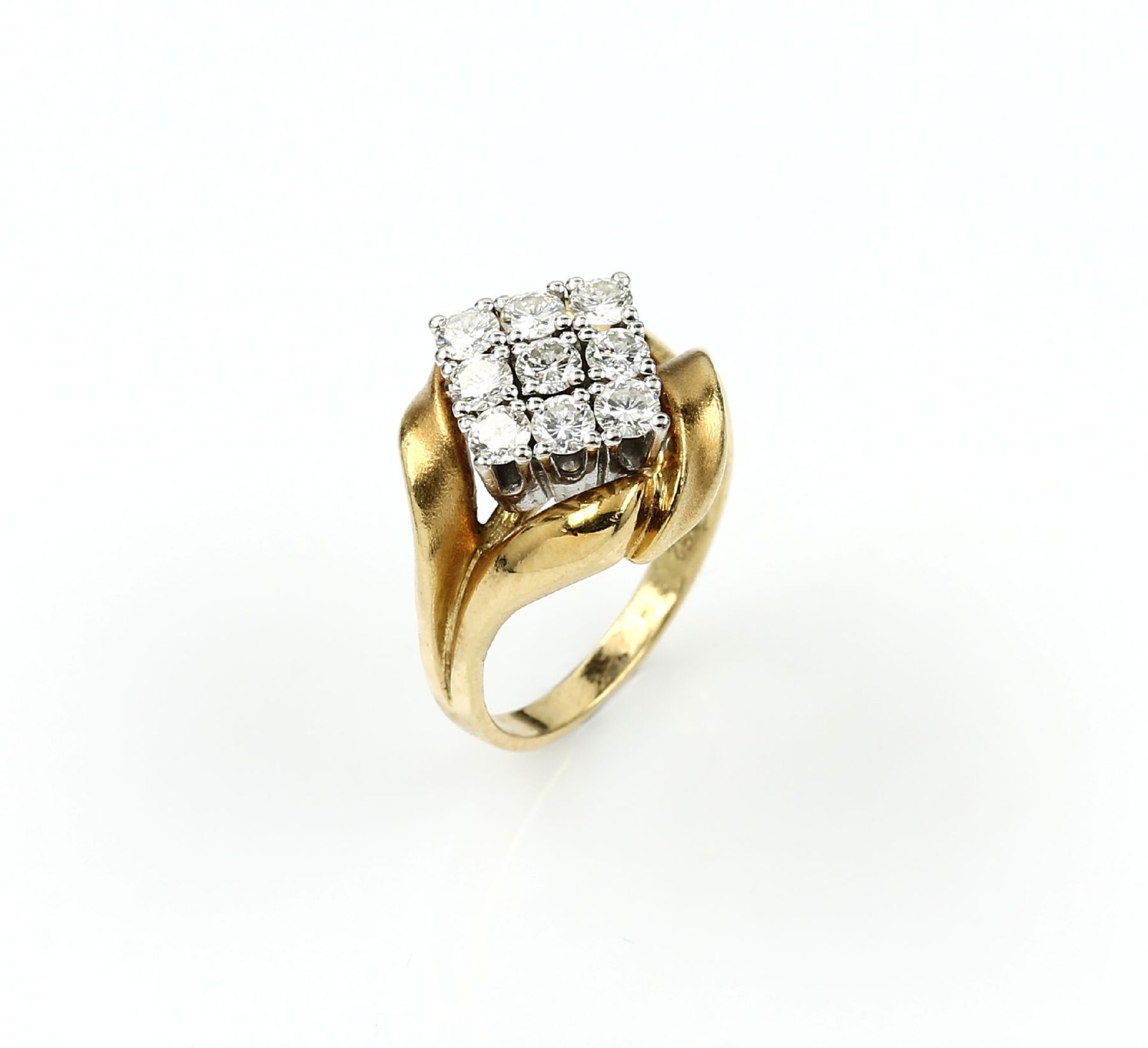 18 kt gold ring with brilliants , YG/WG 750/000, 9 brilliants total approx. 0.72 ct (engraved) Top