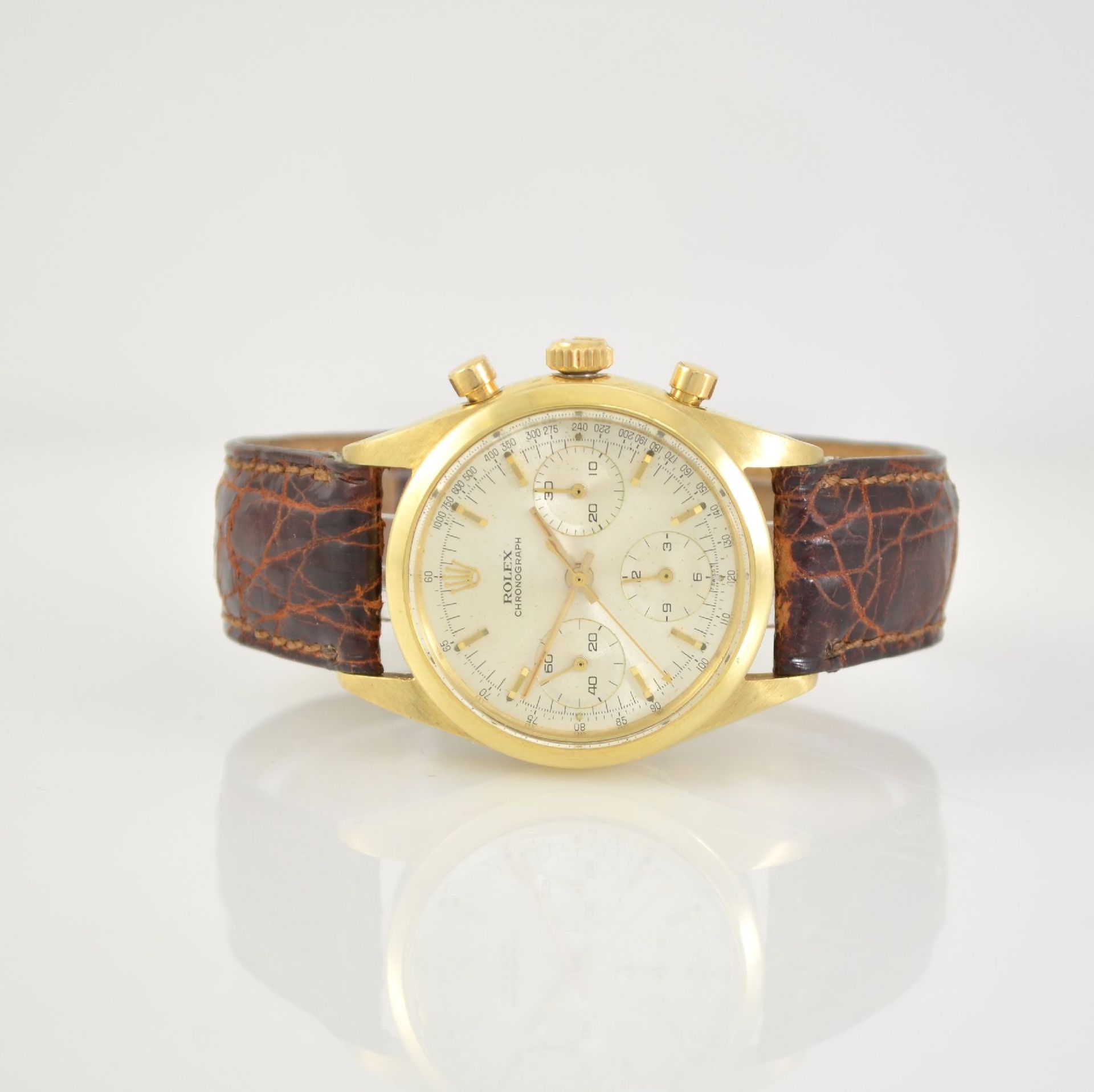ROLEX fine and rare 14k yellow gold intermediate wheel round button chronograph so called Pre-