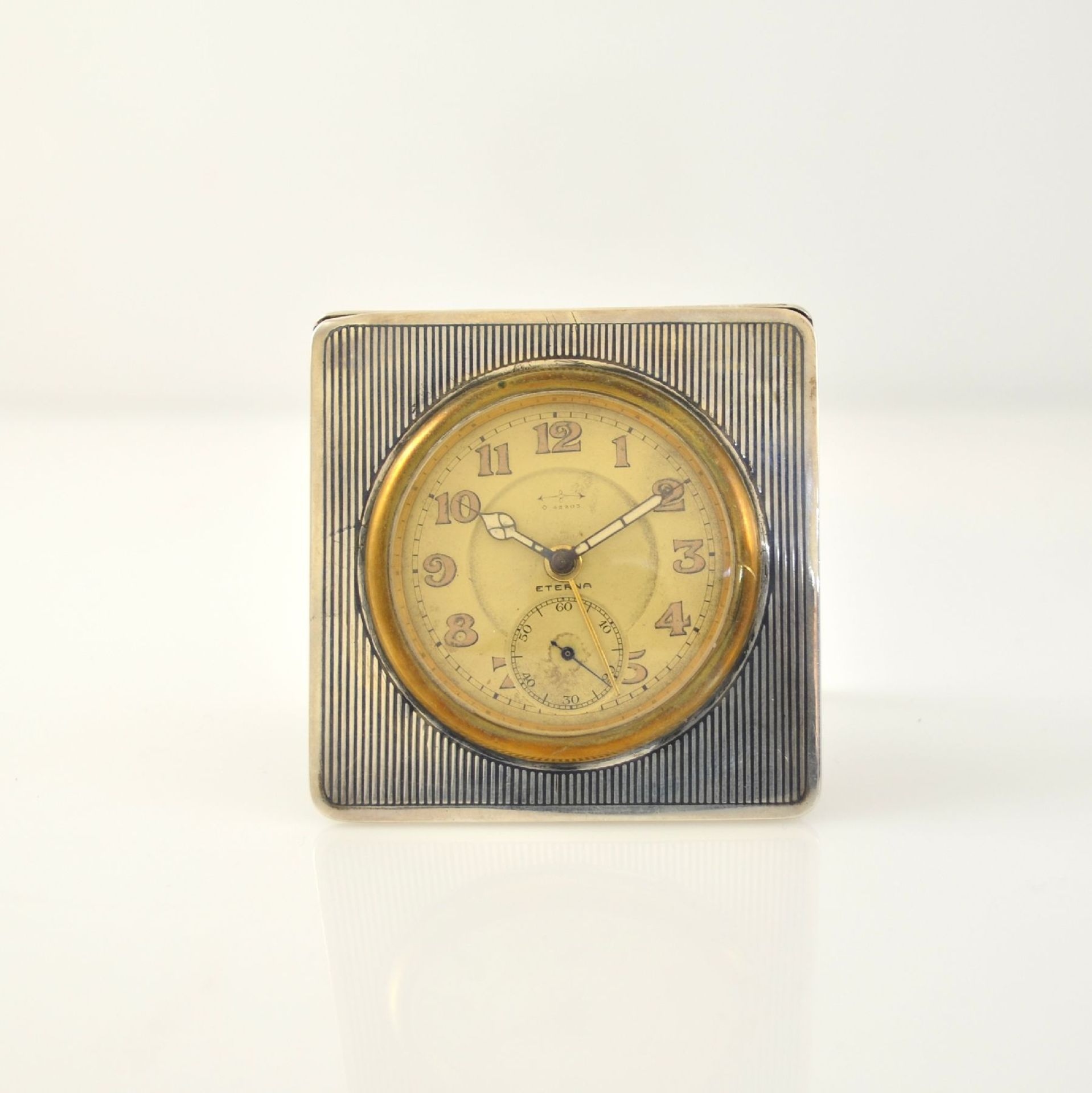ETERNA Konvolut 3 table clocks & one board watch, Switzerland approx. 1910-1930, 1. small board