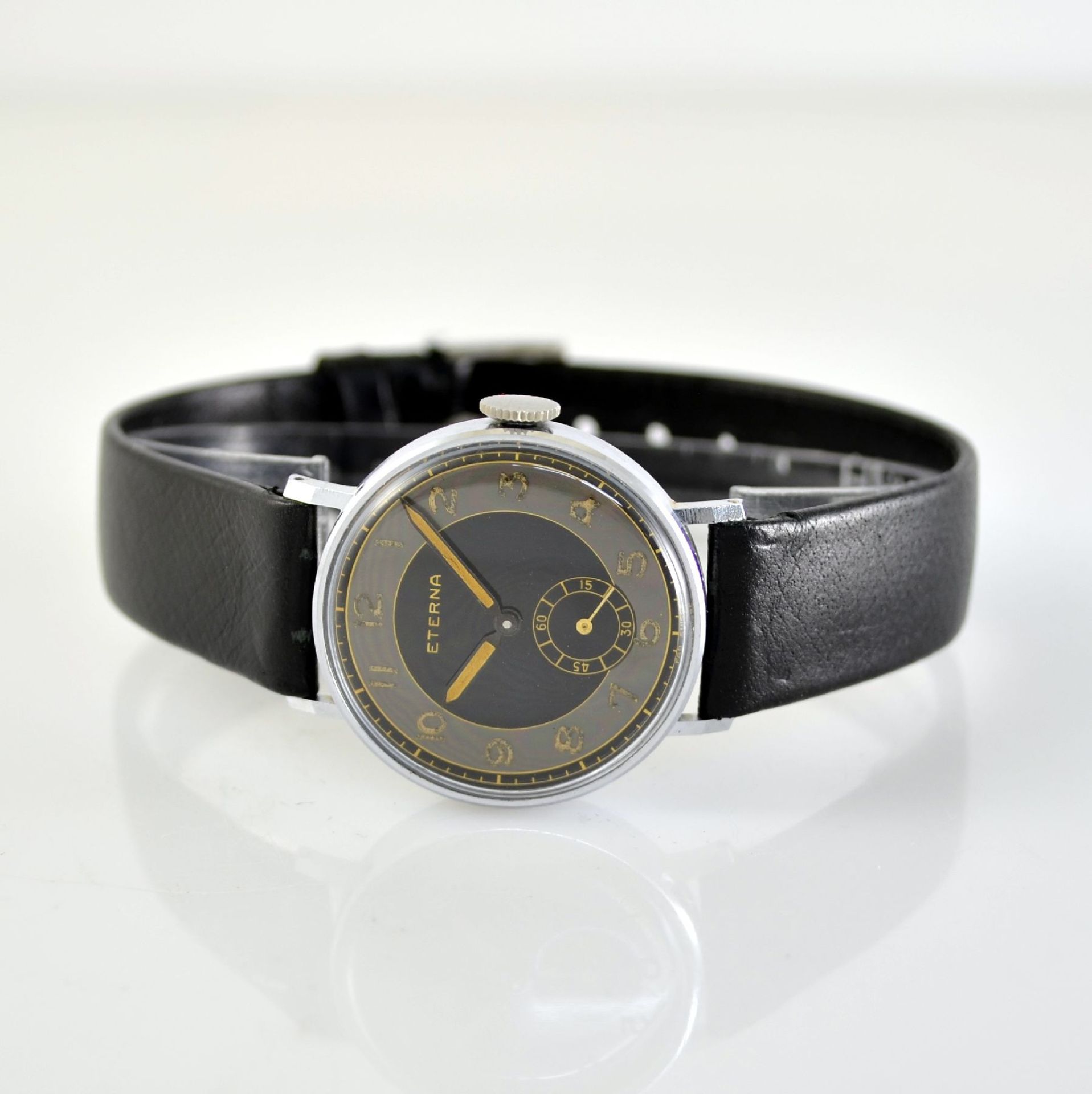 ETERNA 2 wristwatches in steel & chrome-plated with black/grey shiny dial, Switzerland around