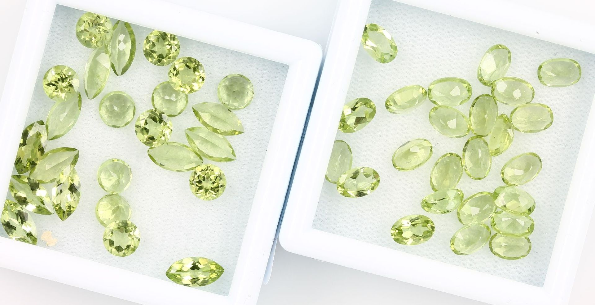 Lot 48 loose peridots , total approx. 24.30 ct, 24 x oval bevelled, 12 x round bevelled, 12 x