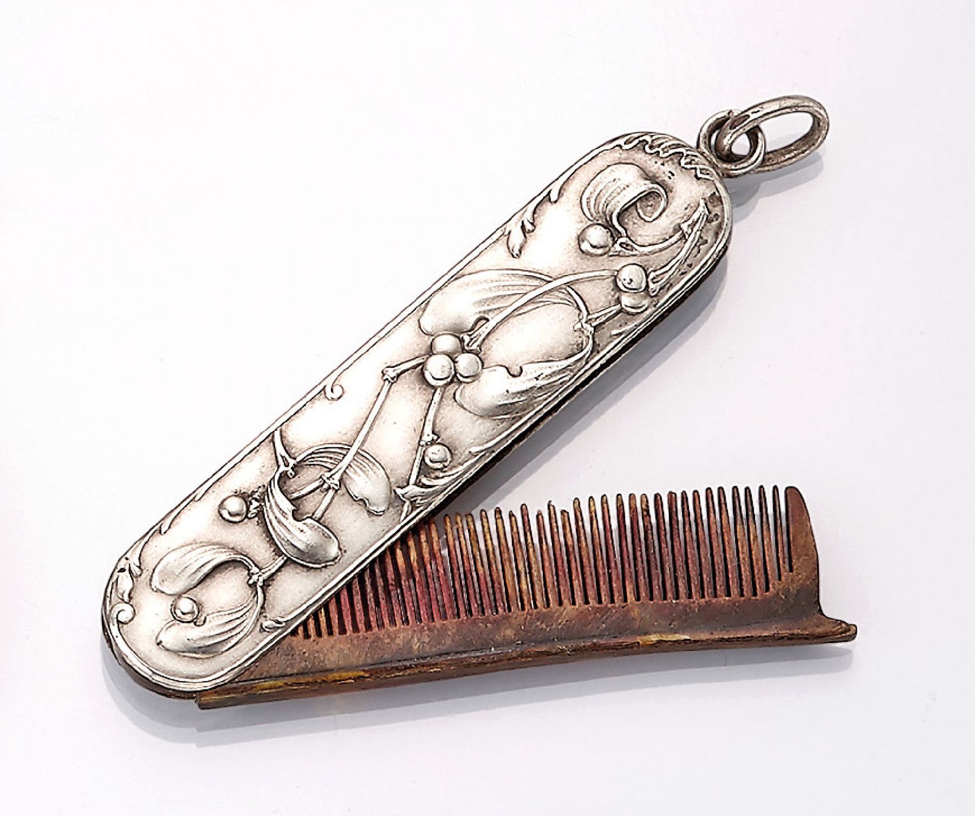 Moustache comb as pendant, France approx. 1900 , 800 silver, decor of mistletoe, comb retractable,