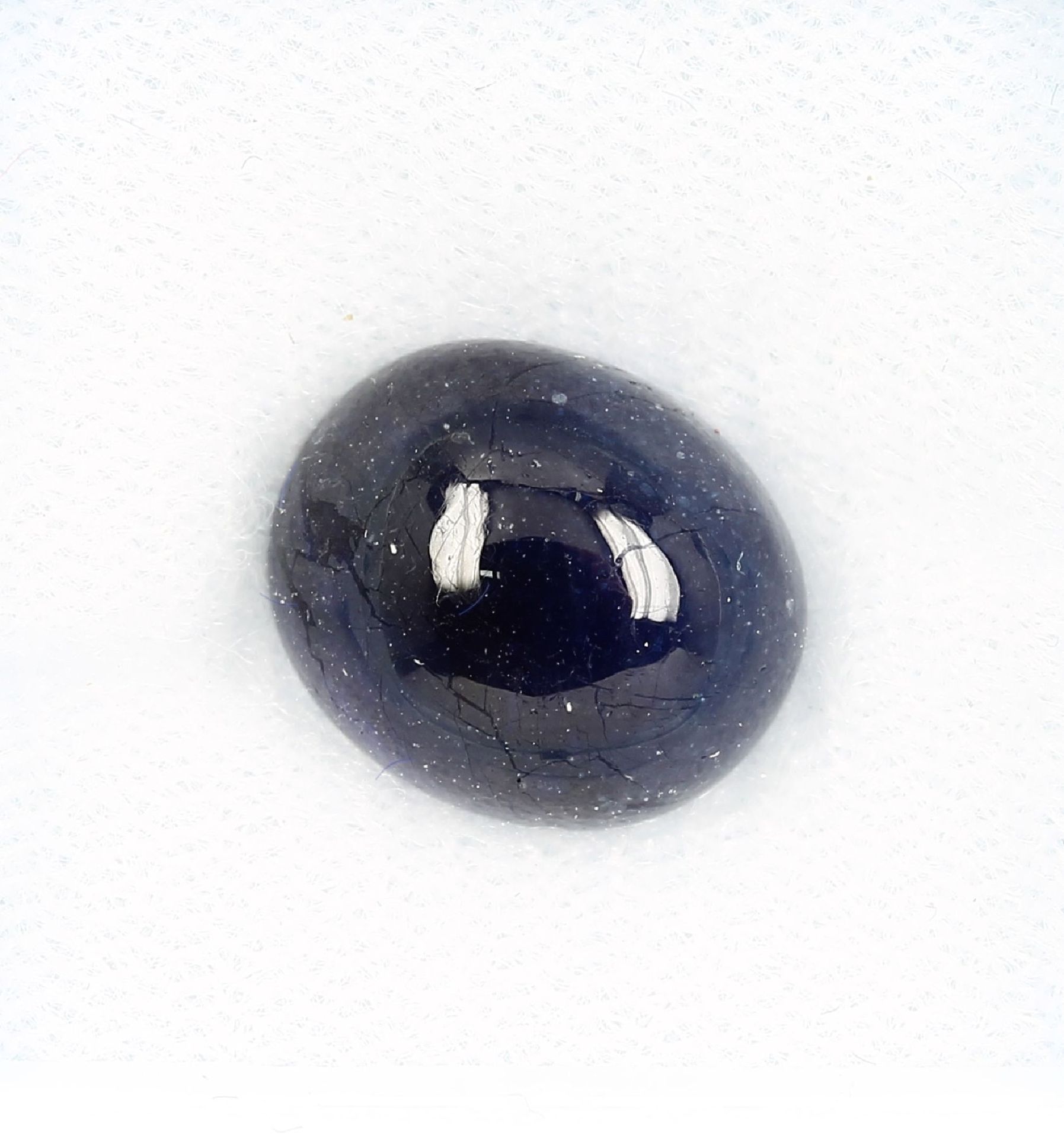 Loose sapphire cabochon , approx. 8.92 ct, oval Valuation Price: 550, - EUR