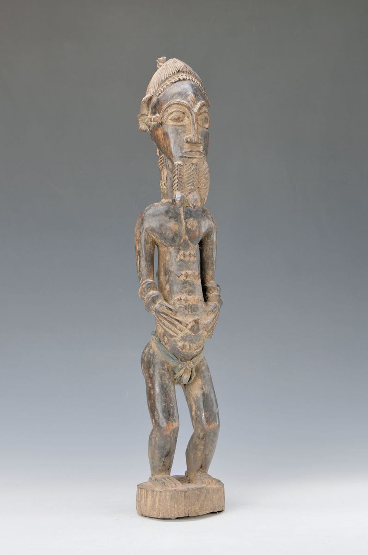 male Ancestral sculpture, Baule/Ivory Coast, approx. 50-60 years old, hardwood, aeruginous, good