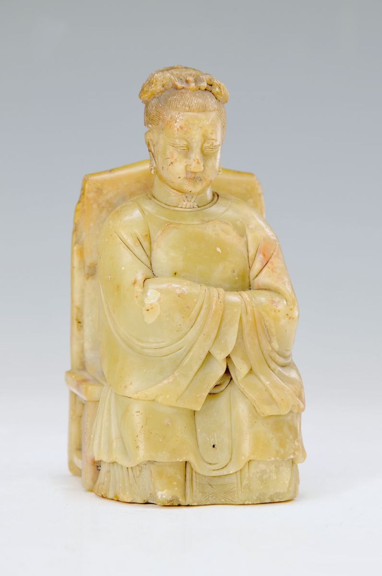 soapstone figurine of a seated lady, China, 18. th c.., finely carved, on the rear side with
