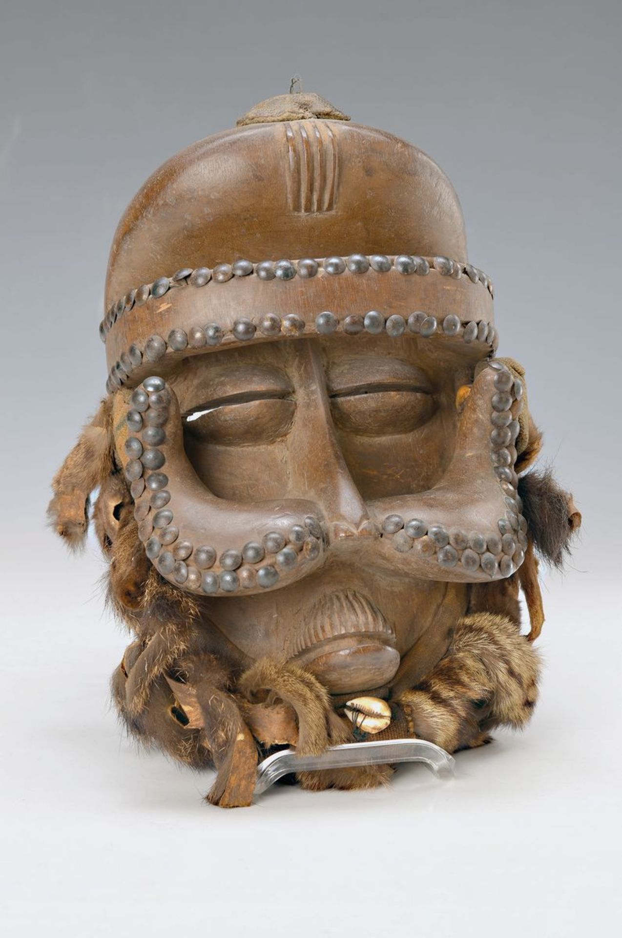 Mask of the Ngere, Nigeria, approx. 60 years old, carved wood, applied with fur pieces, cowrie