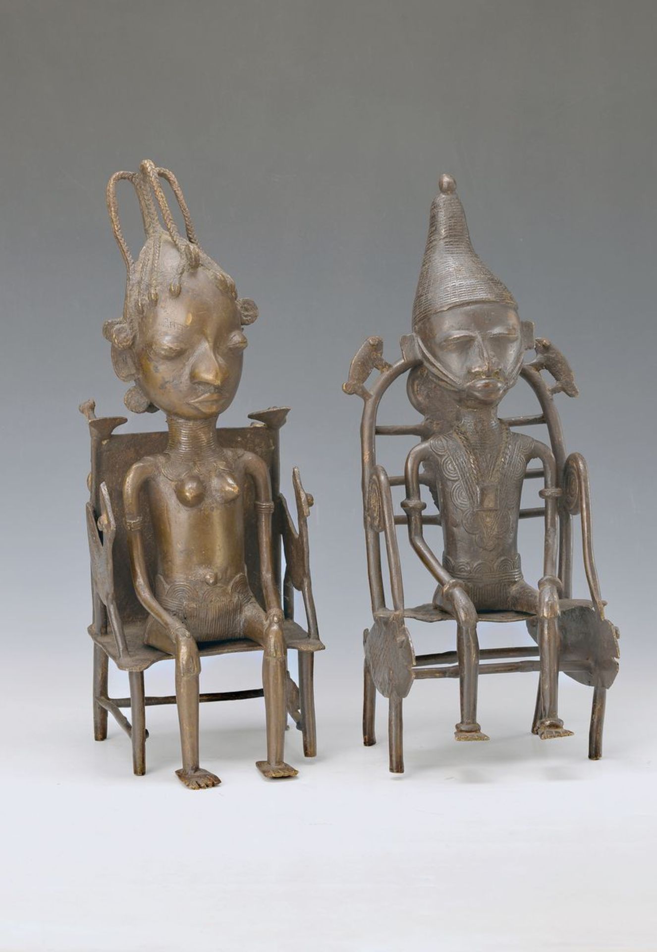 pair of figurines, Benin, 1950s/1960s, Bronze,female and male figure on throne, probably Chieftain
