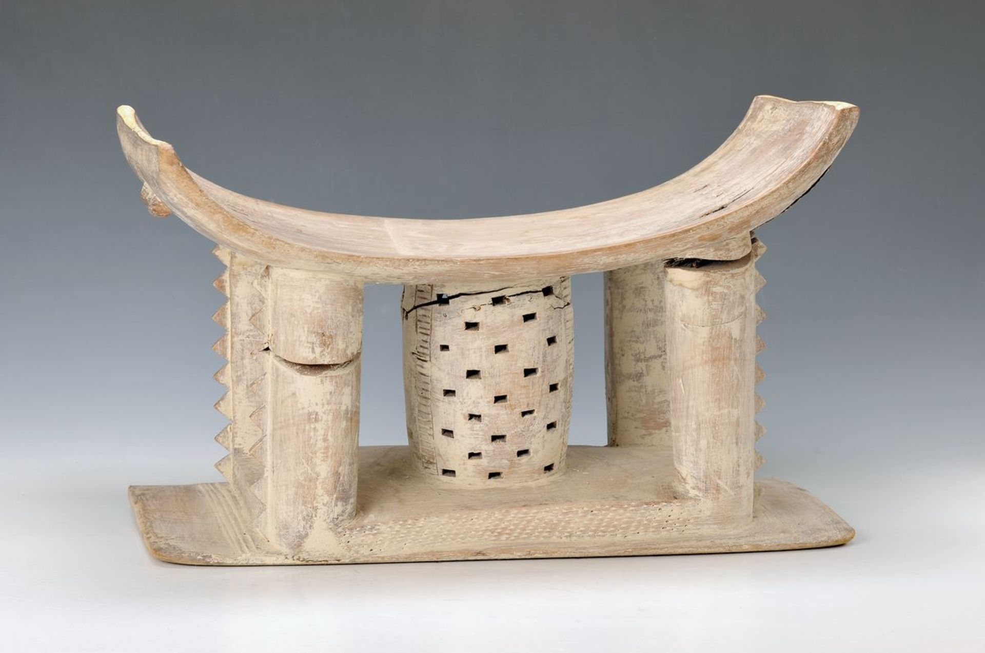 stool of the Ashanti, Ghana, 20th c., carved wood, white cold painting, carved with pip at the