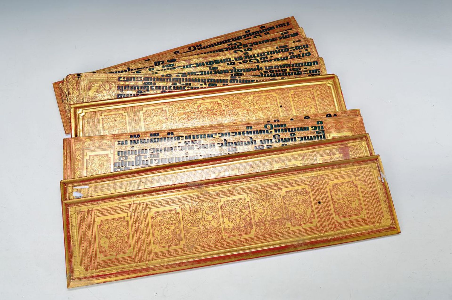 two Kammavaca-manuscripts, and one Book Cover for one manuscript of redwood, probably Burmese,