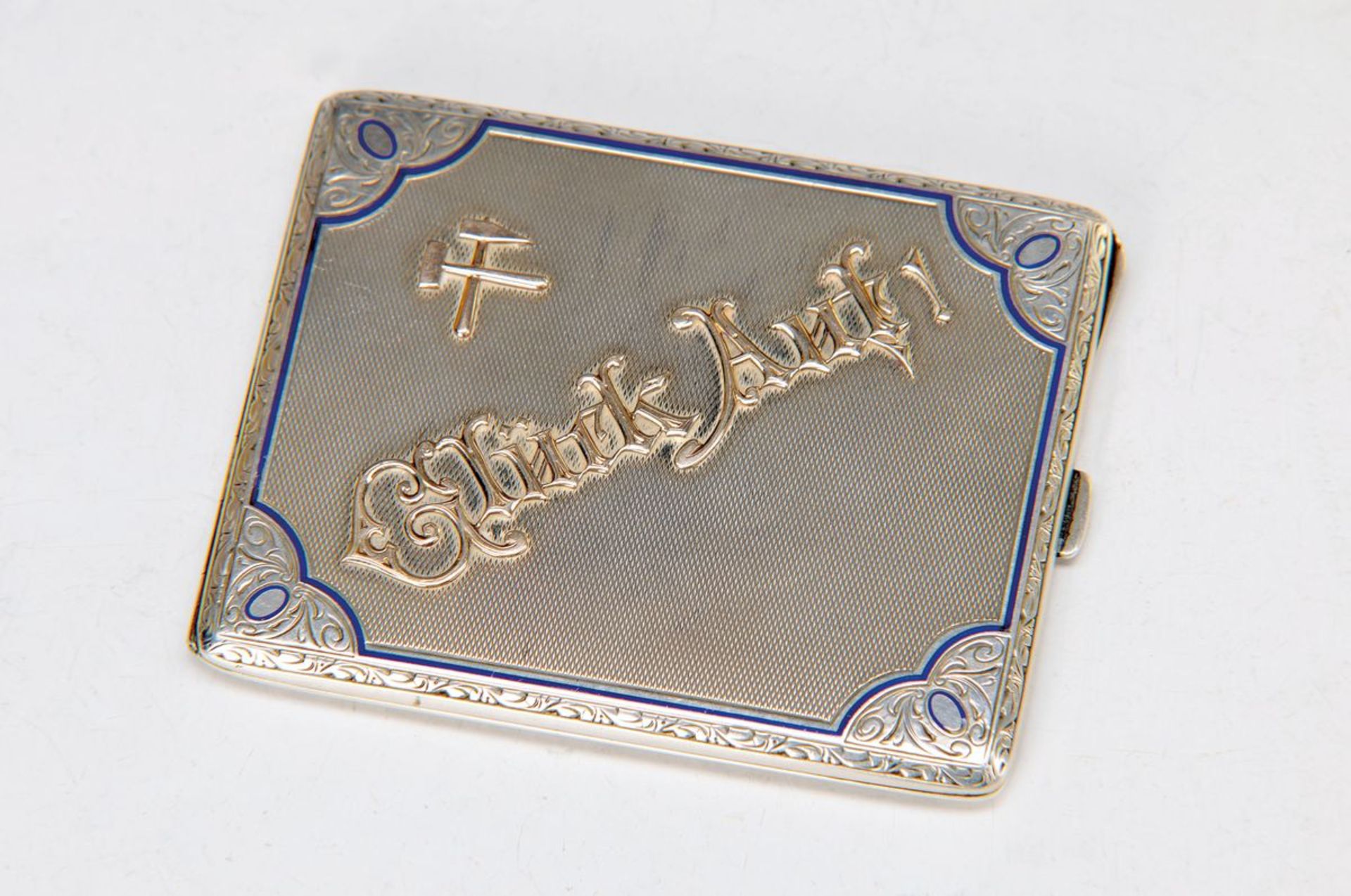 cigarette case, German, around 1900, for a miner, silver engraved and partly blue enameled, with