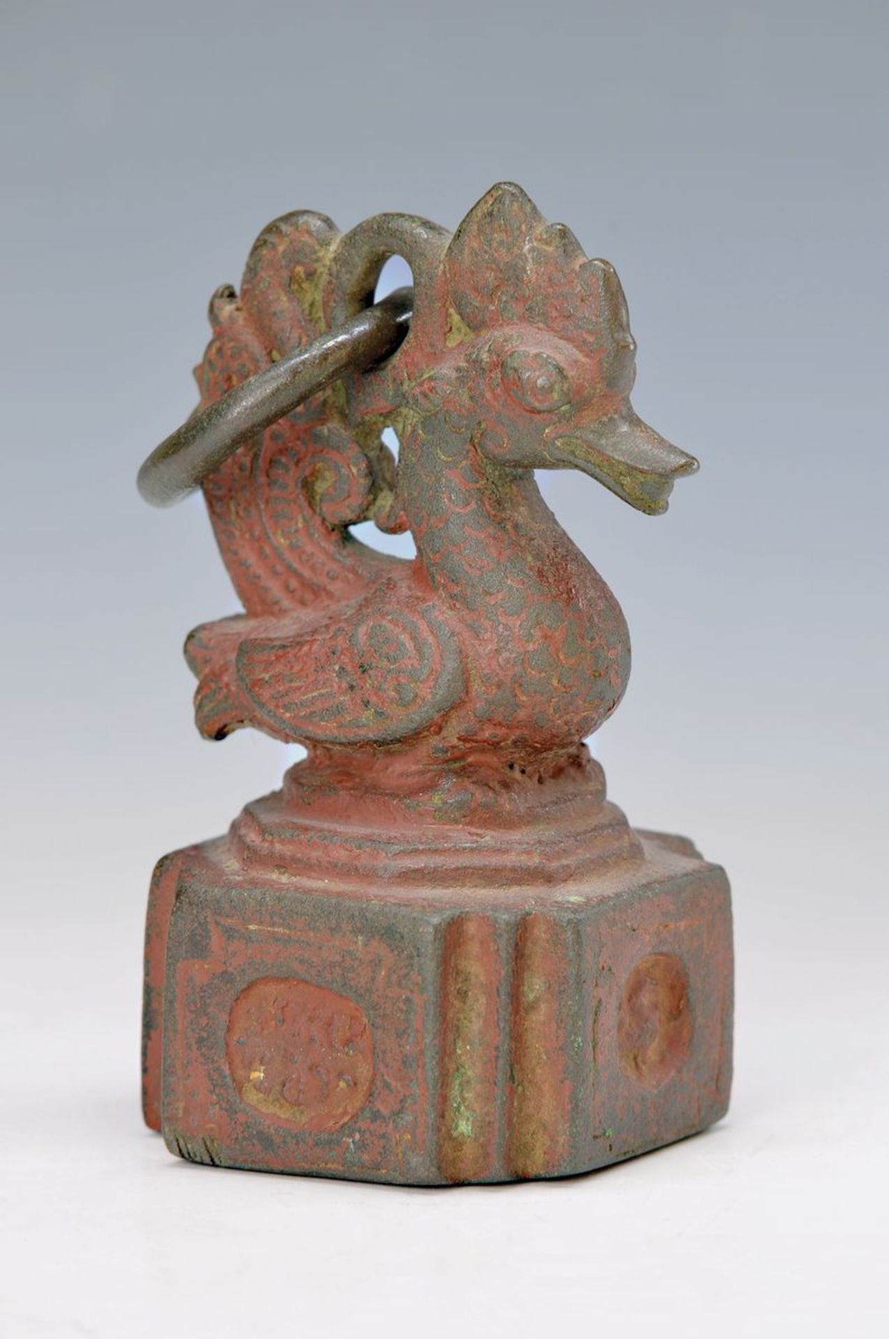 large weight, Nepal, around 1800, Bronze, in shape of a bird, remains former painting, H.approx.