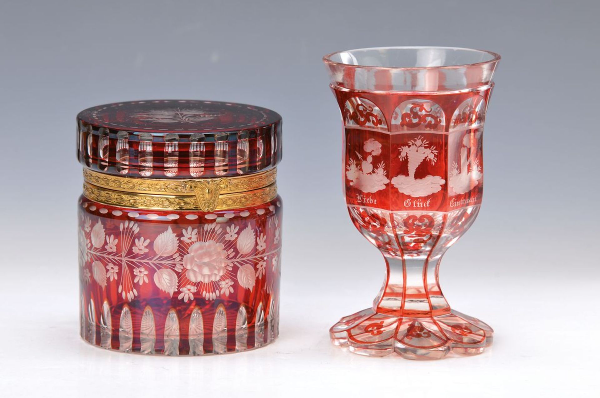 lid box and goblet, Bohemia, 19. and 20 th c.,colorless glass, ruby red: goblet with cut decor
