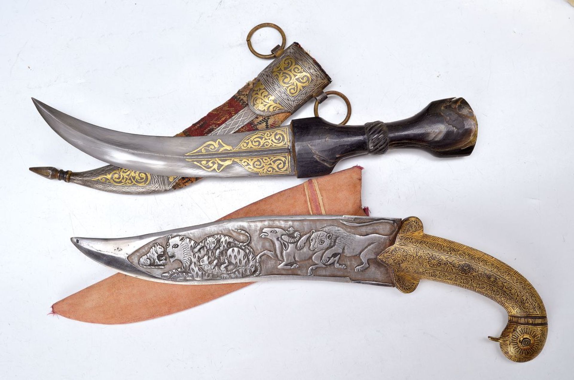 Dagger, probably Morocco, 19. century, blade with on both sides gold colored damascene, horn