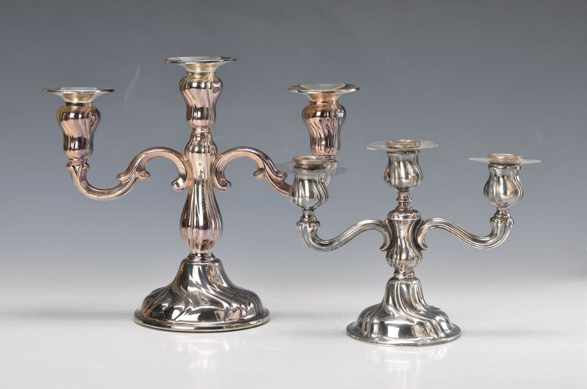 two candlesticks, German, 1930s, 800 and 835 silver baroque shapes, slightly twisted, each three