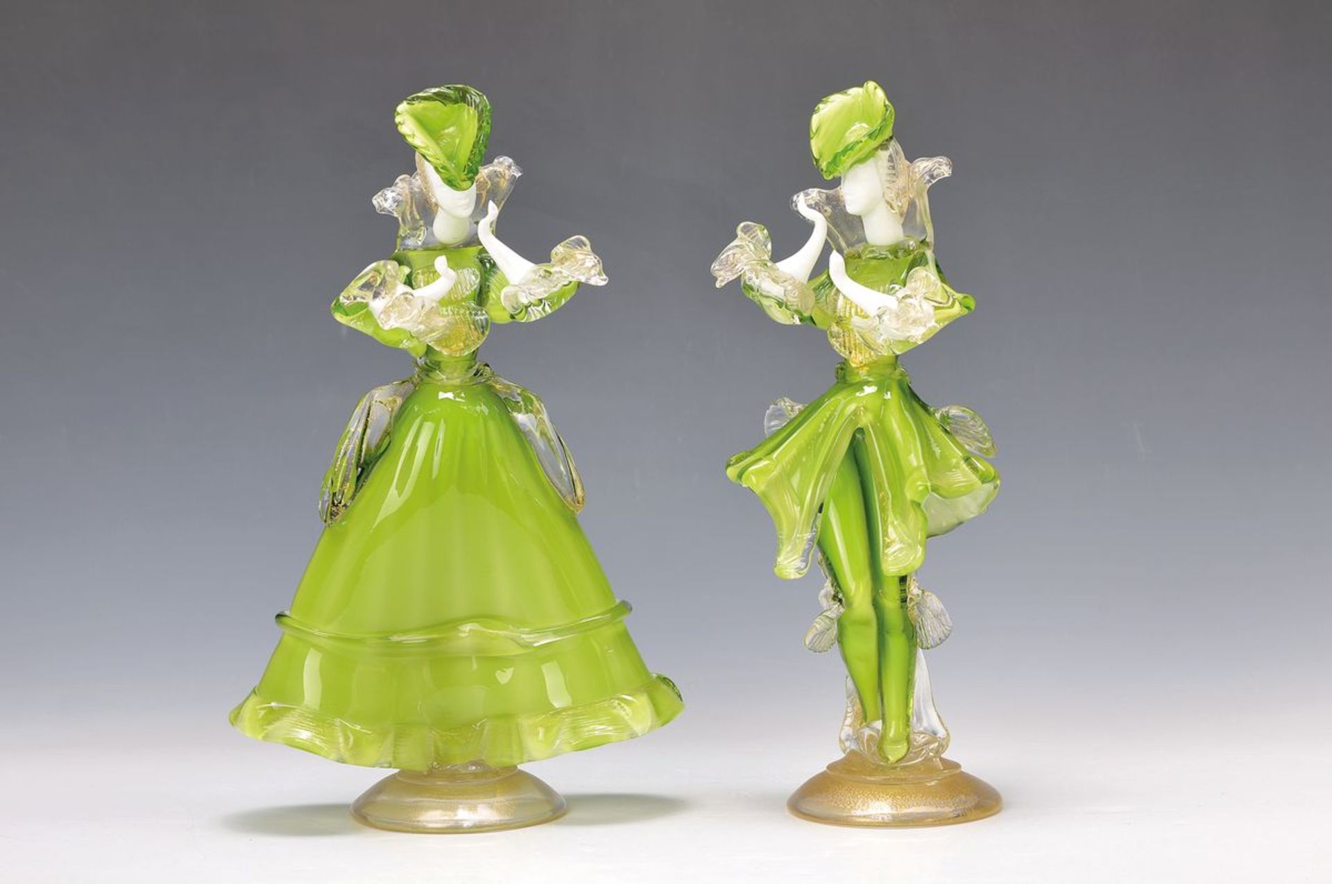 couple of Sculptures, Murano Italy, 20th c., blown glass partially green and opaque white overlay,