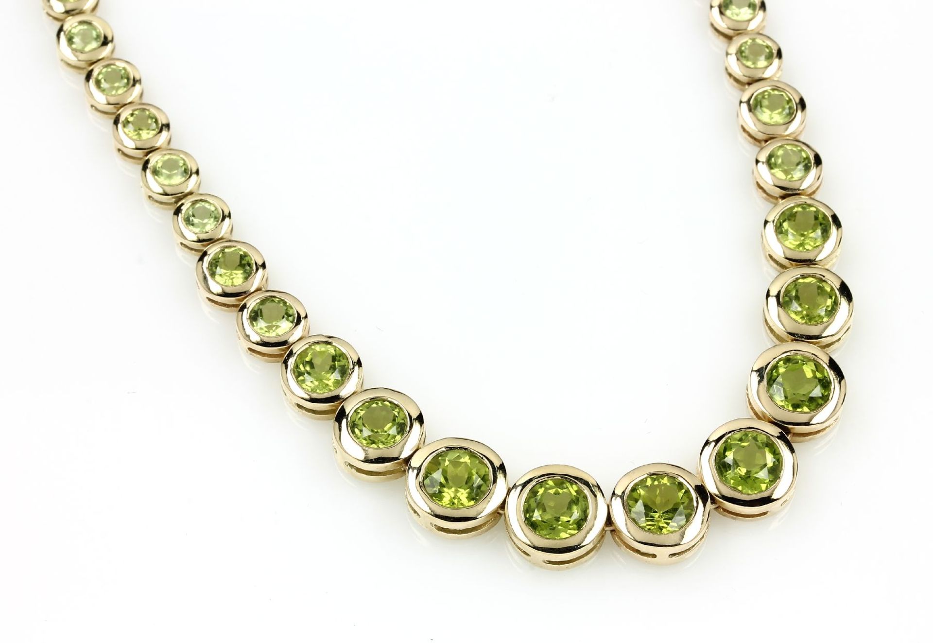 14 kt gold necklace with peridots , YG 585/000, round bevelled peridots total approx.42.0 ct,