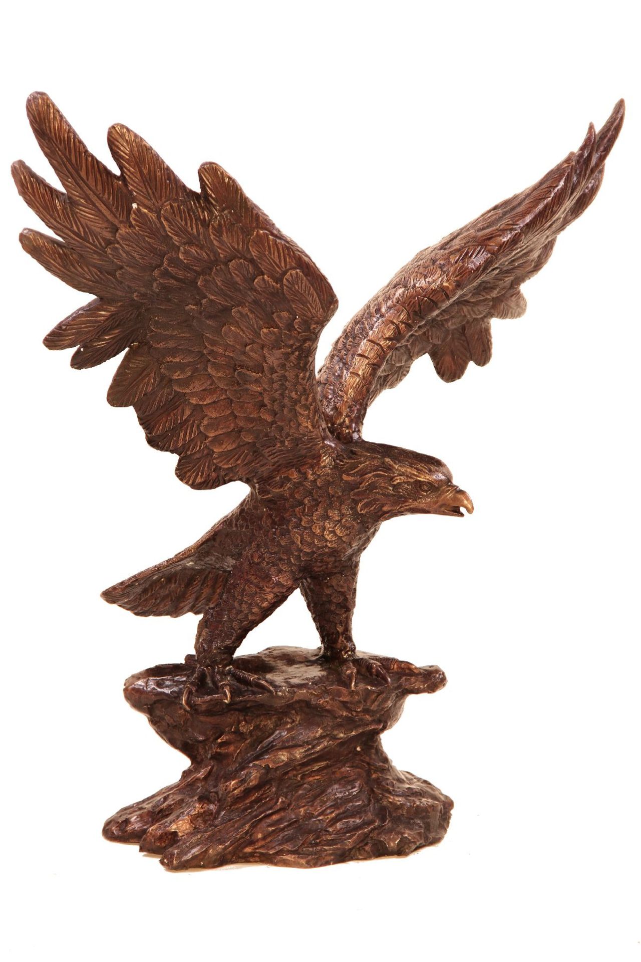 Eagle on rock, bronze, brown and golden brown patinated, moment of take off well reproduced,slight